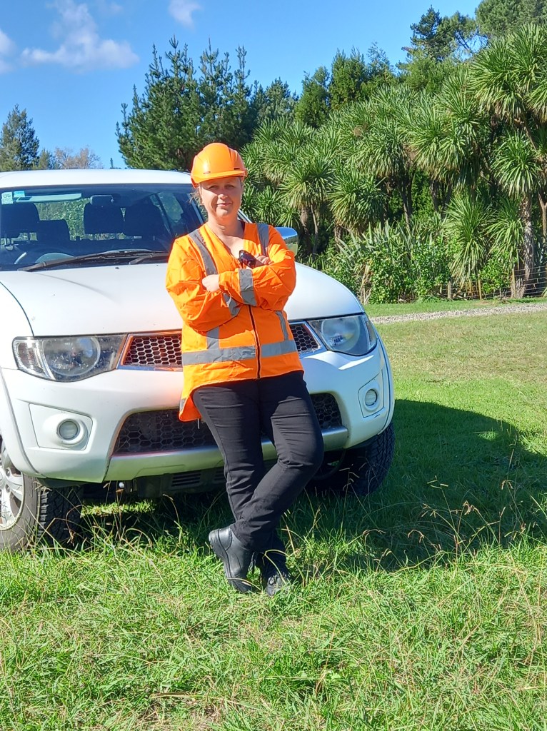 Esther in front of her truck